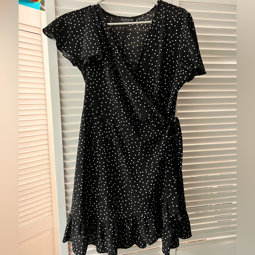Black polka dot wrap mini dress